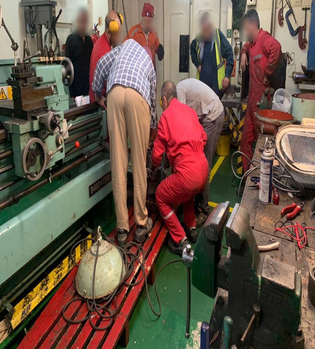 Crew working on technical and maintenance requirements onboard